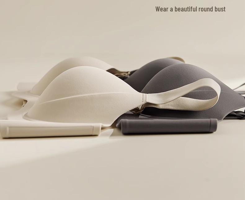 Bezszwowy biustonosz damski: Minimalizuje biust, Wspiera boczki, Bez fiszbin, Bez prześwitów, Podnoszący, Lekki dla większych biustów.