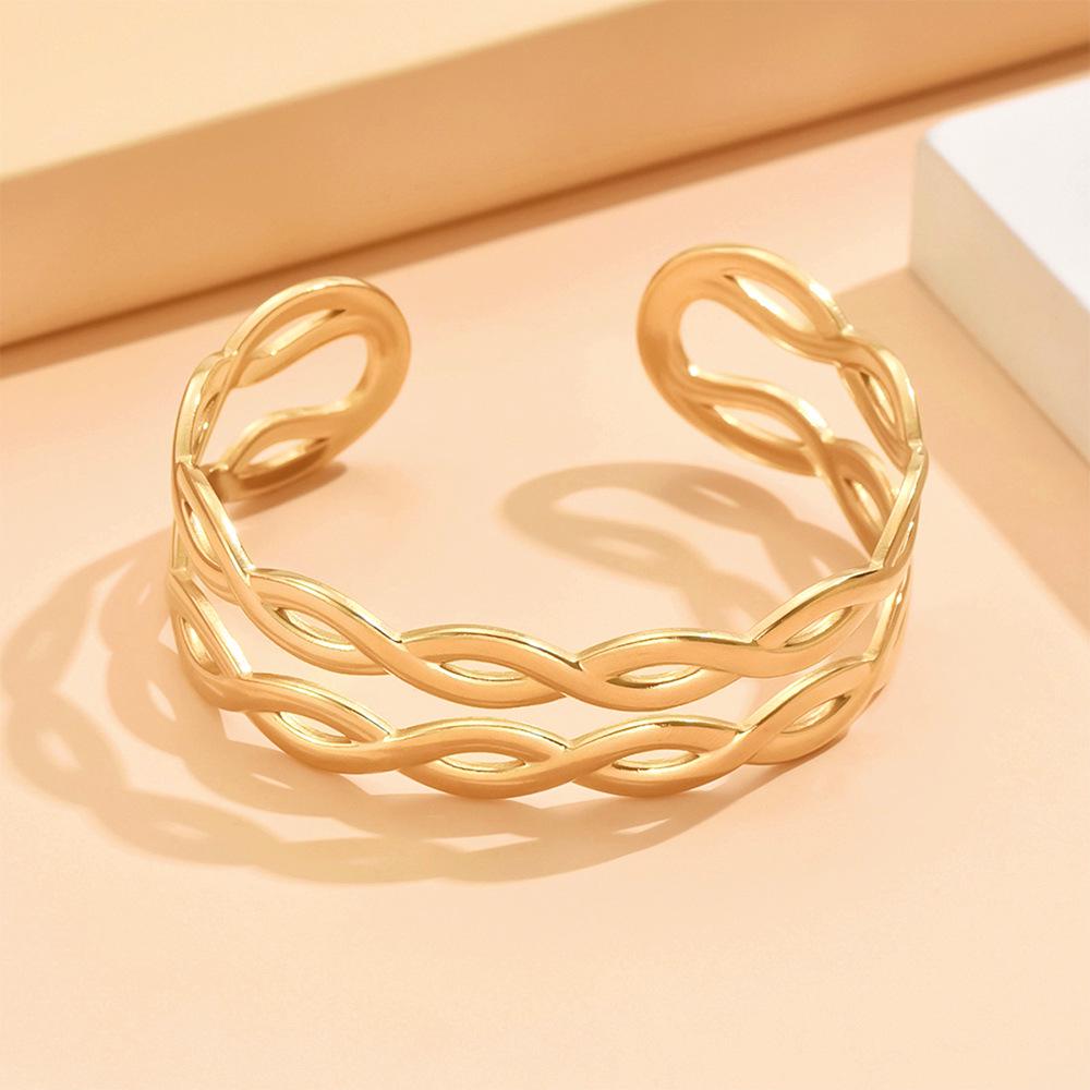 Cross Bestseller Stainless Steel Hollow Intersecting Lines Cuff Bracelet – European American Fashion, Women’s Titanium Steel Jewelry.
