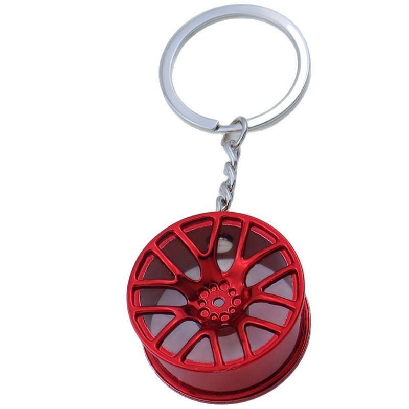 Creative Car Wheel Hub Keychain: Zinc Alloy Metal, Customizable Gift.