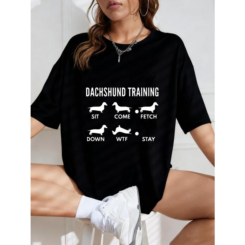 White Oversized T-Shirt With Dachshund Training Graphic And Text For Casual Wear