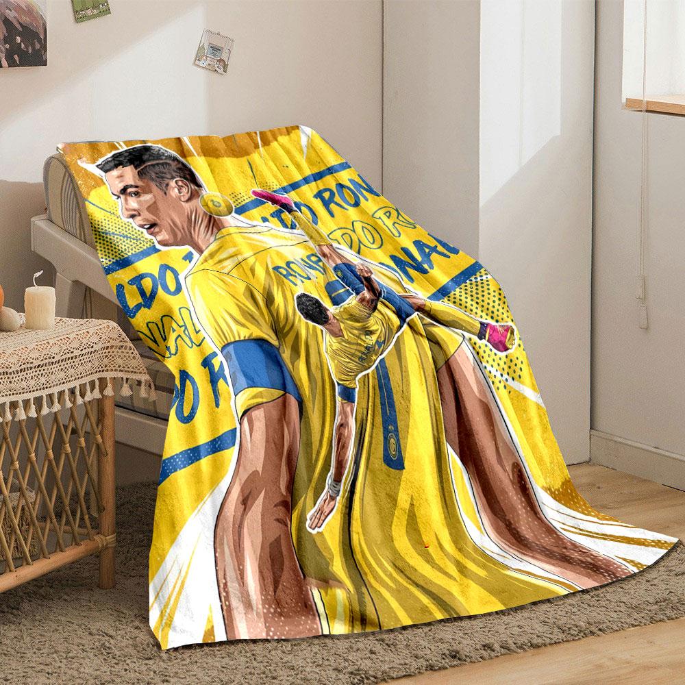 A dynamic soccer-themed illustration with bold yellow and blue colors. for all seasons blanket lunch break throw gift