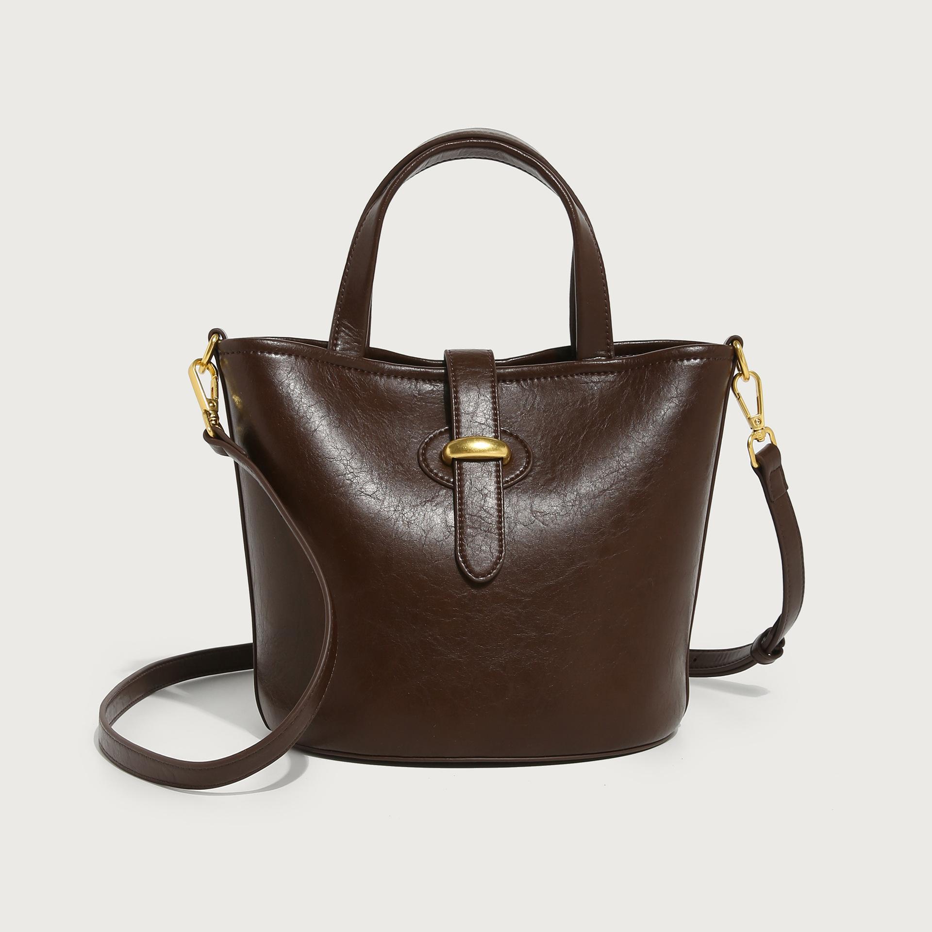 

2024 Spring/Summer New Women s Bag Coffee Color Bucket Bag Handbag High-Quality Niche Single-Shoulder Crossbody Bag for Commuting кавовий