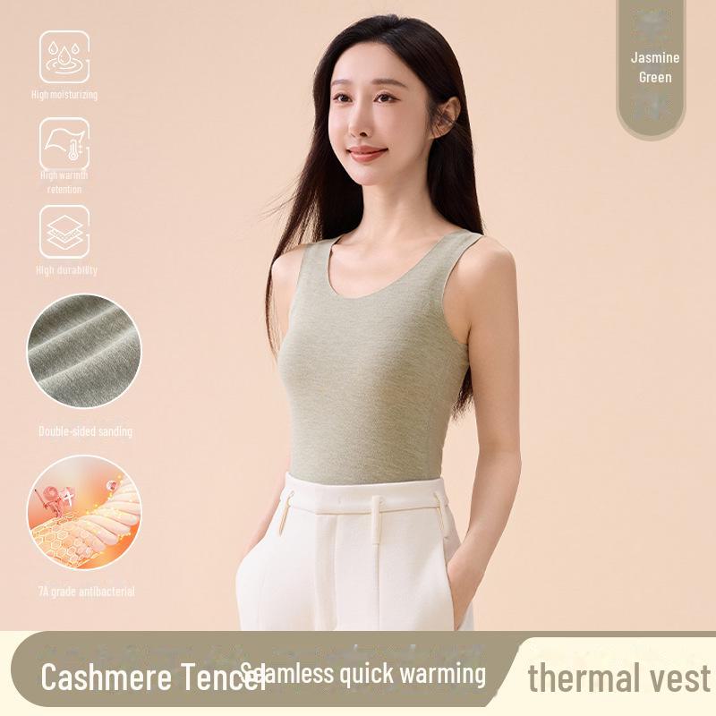 

Жіночий кашеміровий оксамитовий жилет з підігрівом та безшовний топ з тенселу на осінь та зиму XXL жасмін/зелений