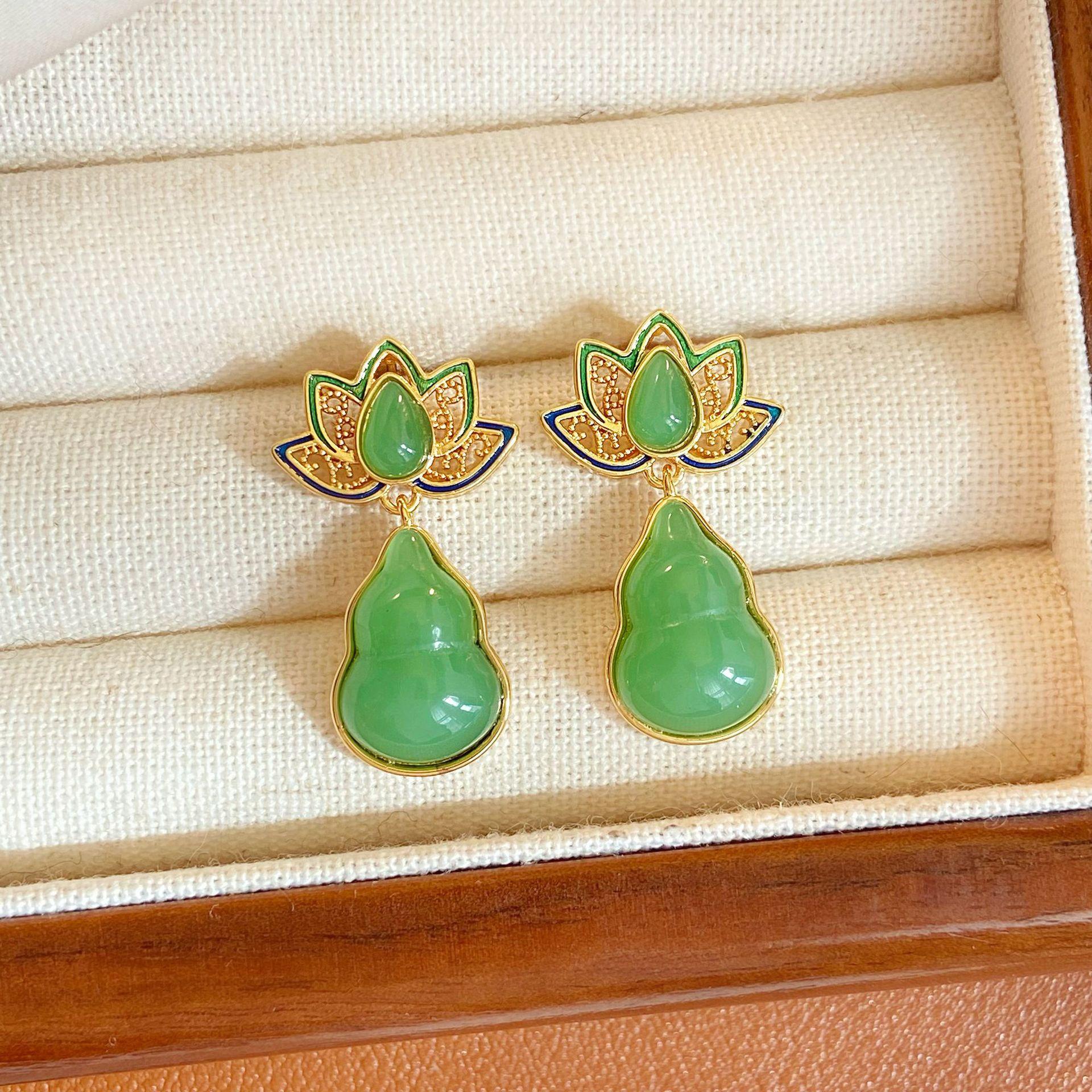 

Серьги-гвоздики в виде тыквы из смолы и лотоса, модный дизайн, серьги-гвоздики, серьги с высоким чувством личности и темпераментом