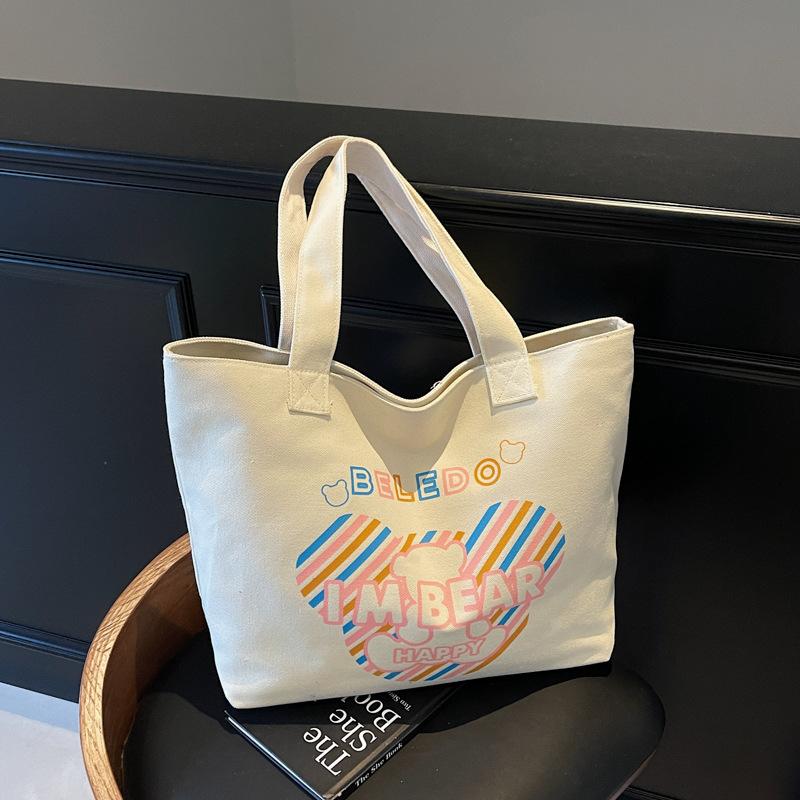 

Корейская версия повседневной холщовой сумки большой вместимости женская 2025 новая сумка-тоут с принтом букв студенческая сумка для занятий сумка для покупок бежевый