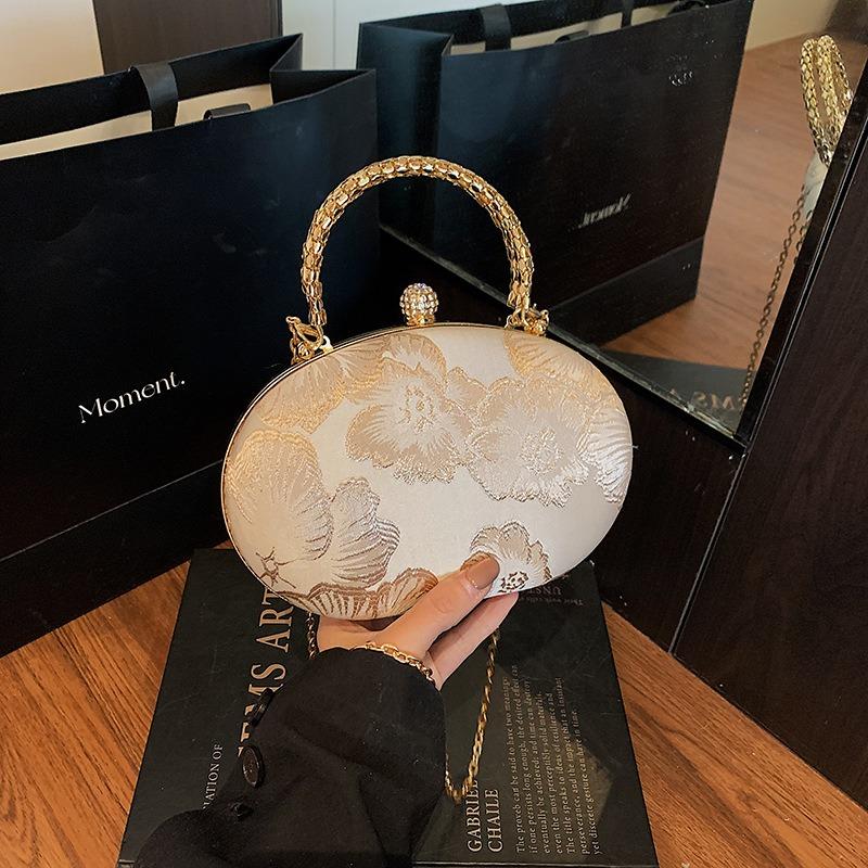 Design niche ball bag women's new portable fashion chain small bag dinner mini embroidered oblique span bag