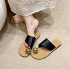 Korean fashion metal buckle cover toe slippers women's summer wear New Year's new flat-bottomed comfortable one-word with cool slippers