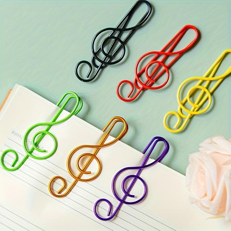 10 Color note shaped paper clips randomly selected