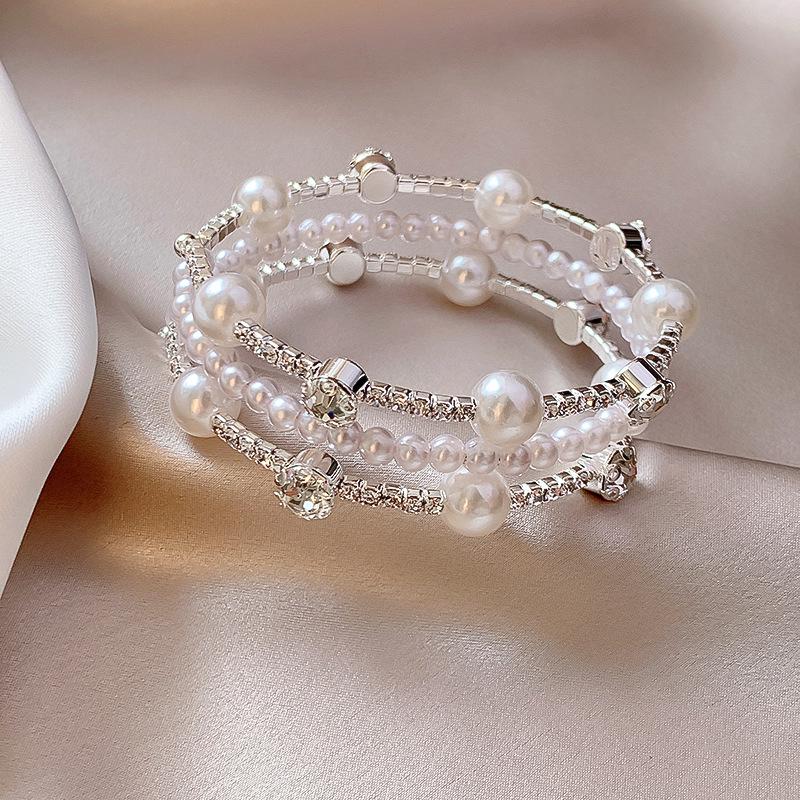 2025 Trendy Pearl Zircon Flower Bow Bracelet: Women's Chic, High-End, Versatile Design