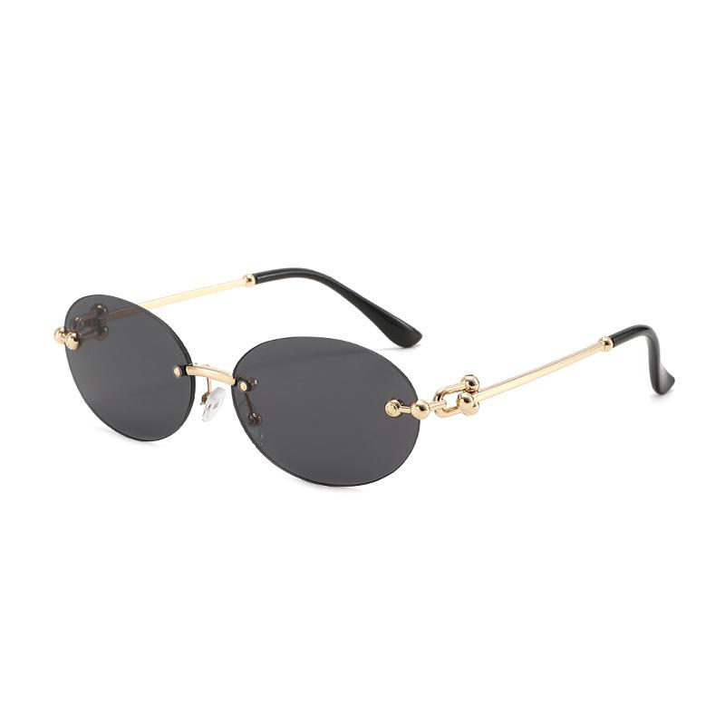 2025 Trendy Retro Rimless Metal Sunglasses: European & American Style UV Protection for Women