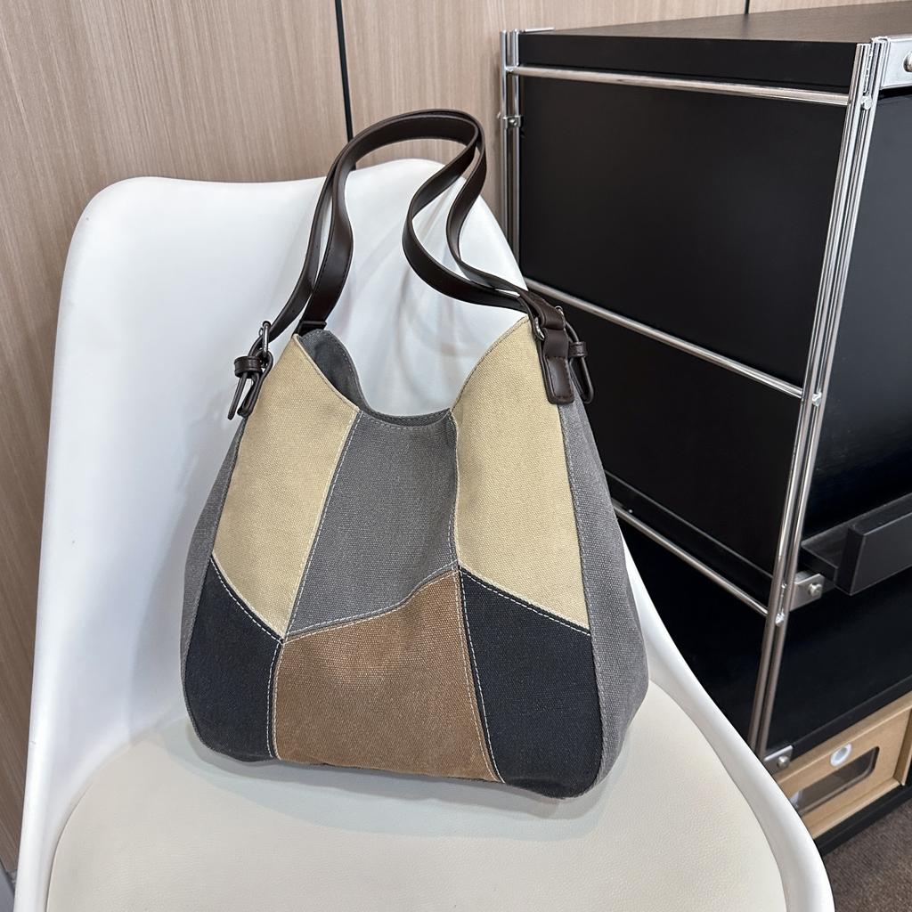 Einfache und modische Damenhandtasche geometrische kontrastfarbene Canvas-Tasche Damen-Retro-Spleiß-Stofftasche mit großem Fassungsvermögen neue Umhängetasche
