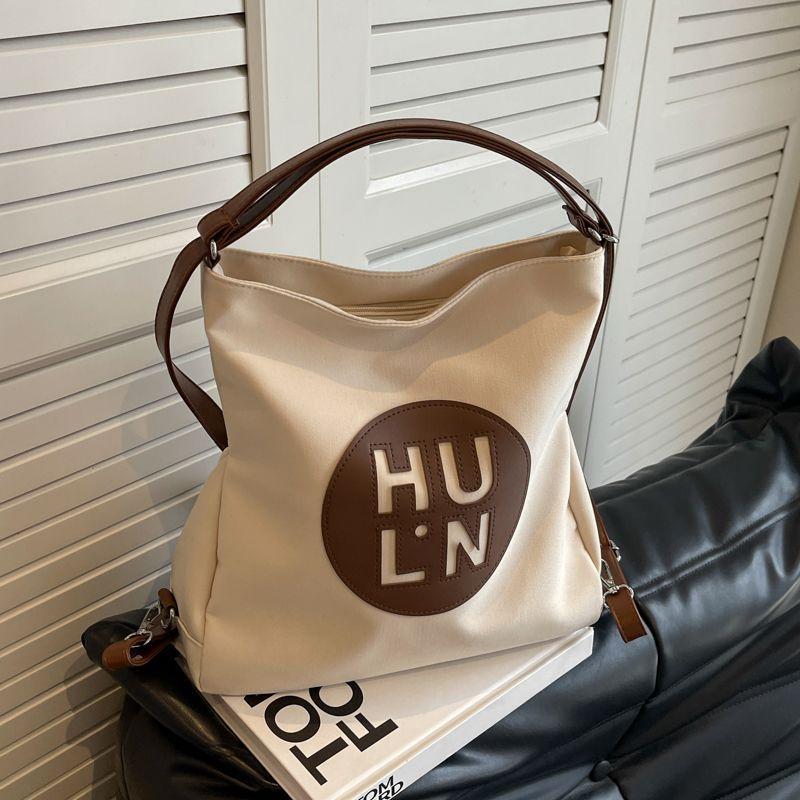 

Canvas bag women s new fashionable large-capacity multi-purpose backpack student class commuting messenger tote bag