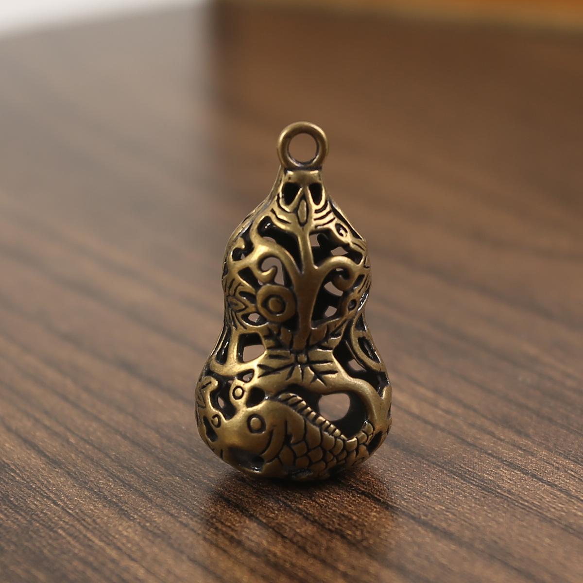 

Brass two-color primary color hollow Pisces gourd key car pendant pendant ring stall explosion unisex