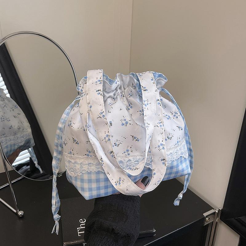 

ins blue spring and summer women s floral plaid splicing handbag drawstring bundle mouth bag hand carry messenger bag синій