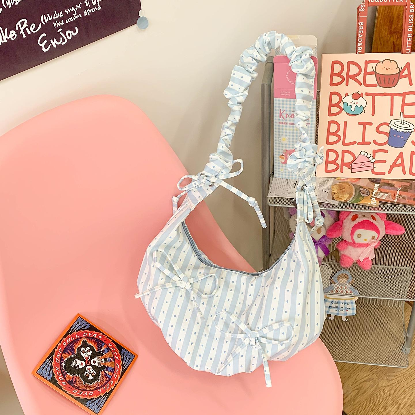 

Striped bag women s large-capacity new summer leisure niche one-shoulder crossbody pleated commuter dumpling bag синій