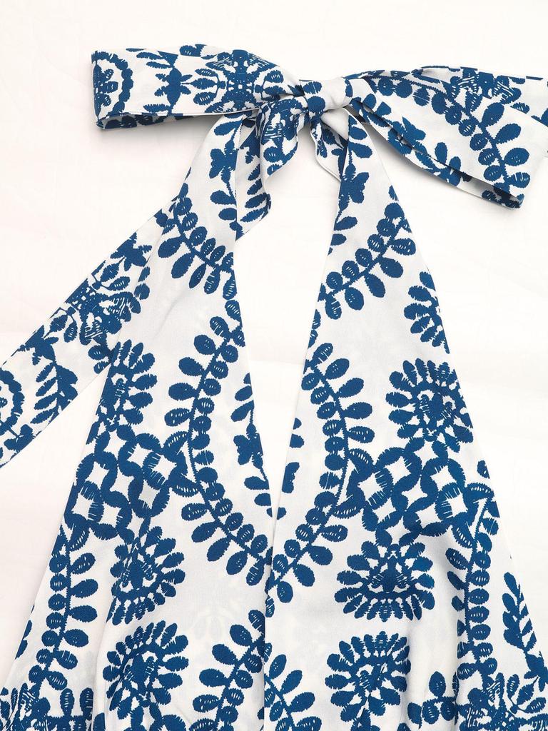 2026 Women's Summer Beach Halter Print Long Dress - Backless, Sleeveless, and Perfect for Vacation.