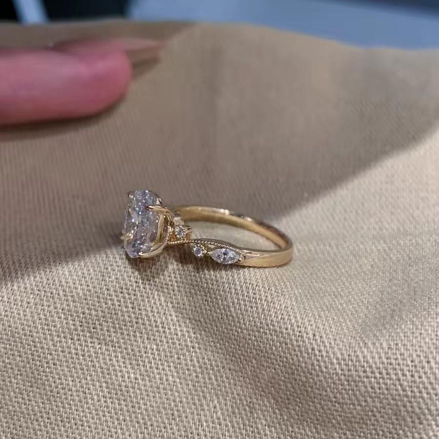 Thousand gold sense simple gold oval flash diamond ring light luxury high sense temperament high sense niche design ring woman