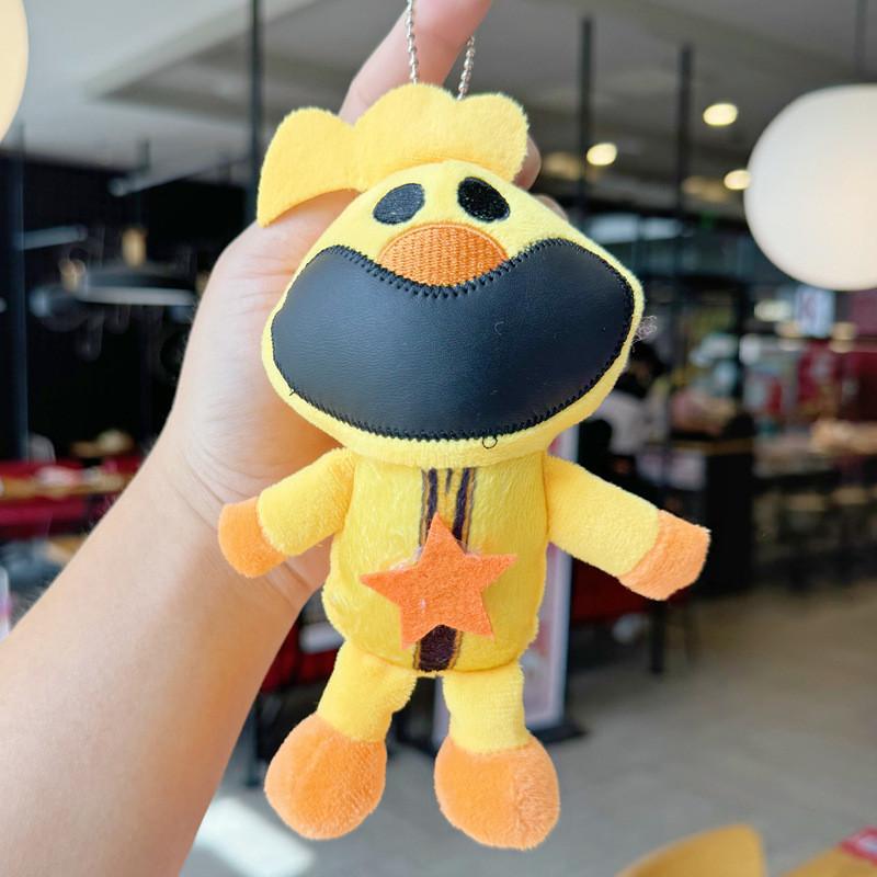 Nyckelring med leende småkryp och plyschdjurshänge, för samlare och presentgivare