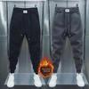 Men's Korean Style Winter Casual Sports Pants, Plus Velvet, Nine-Point Stretch, Trendy Drawstring Design.