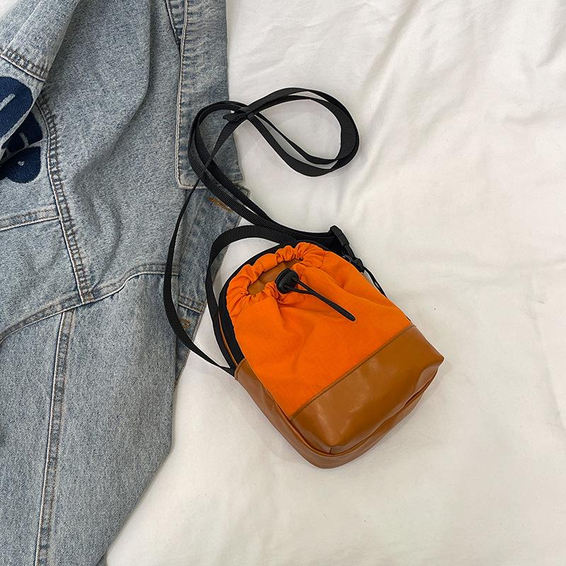 Niche sports messenger bag casual small bag street men and women simple 2025 spring trend shoulder bucket bag