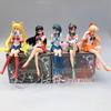 Sailor Moon Sitting Pose Cup Noodle Press Figure Set: Usagi Tsukino, Venus, Mercury, Jupiter, Mars.