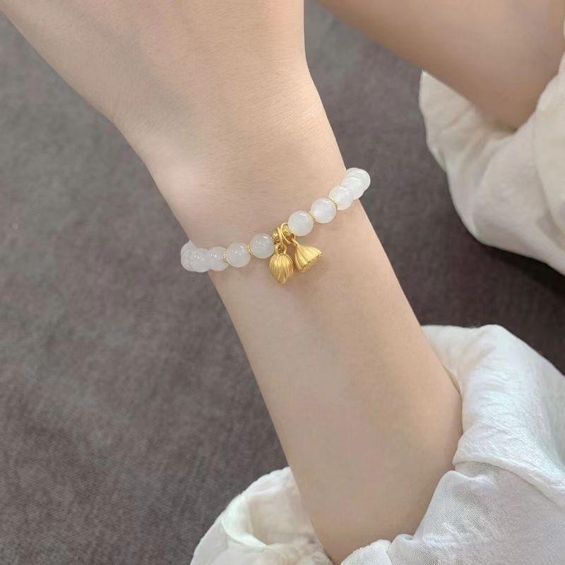 The new Two Worlds Huan bracelet is not colored, jade beads step by step, lotus flower, lotus pod bracelet, niche transfer bracelet.