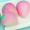 1 Simulated Color Changing Strawberry Toy, A Stress Relief Toy That Changes Color In The Sunlight, and A Decompression Rebound