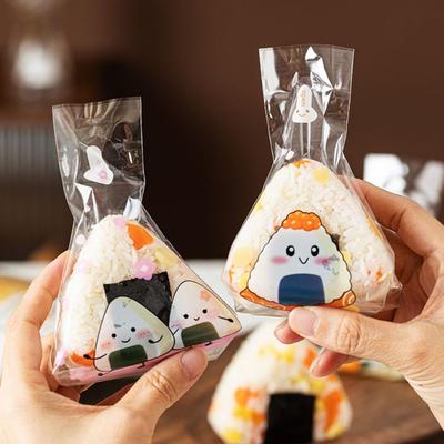 100 Pièces Sacs d'Emballage Triangulaires Jetables pour Boules de Riz Transparent Motif Dessin Animé Enveloppe pour Boules de Riz Sac DIY Japonais Sushi Sac Affaires