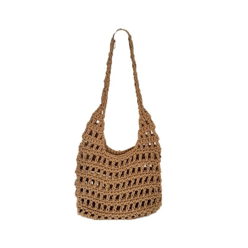 Korean hollow large-capacity straw woven bag new simple light luxury versatile seaside vacation beach shoulder bag