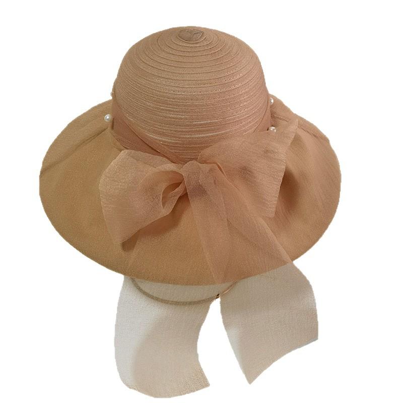 Hat women's new fashionable foreign style bow pearl mesh big eaves sunscreen hat elegant face small sale