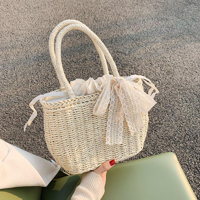 2025 Summer New Straw Bag Women's Seaside Portable Vacation Woven Bag Vegetable Basket Beach Bag Temperament Women's Bag