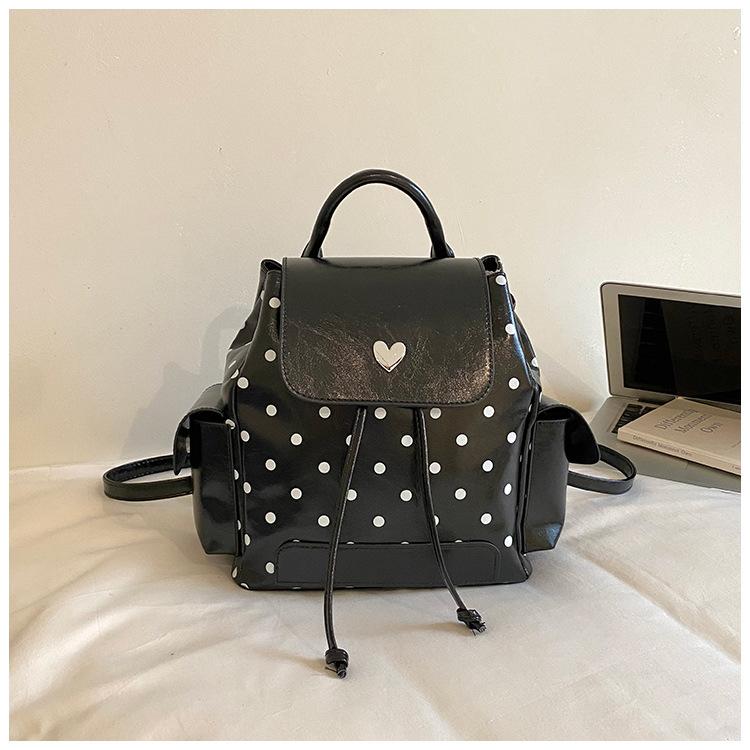 Schoolbag high value polka dot backpack 1011 summer new large capacity junior high school student schoolbag college student commuter backpack