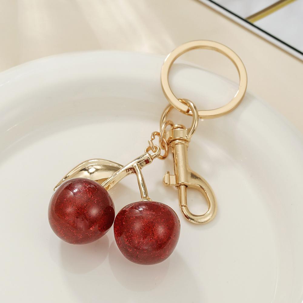 Cherry keychain, gold color chain, elegant women s bag pendant, Christmas and Valentine s Day graduation gift.
