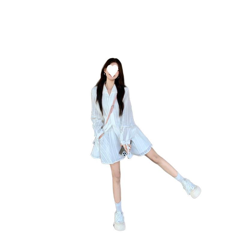White small lapel long-sleeved dress women's spring dress new design sense lace-up and thin waist A-word short skirt