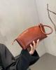 Retro First-layer Cowhide Women's Bags Women's Bags Fashionable and Practical Dumpling Bags Shell Bags Simple and Versatile Hand Grab Bags