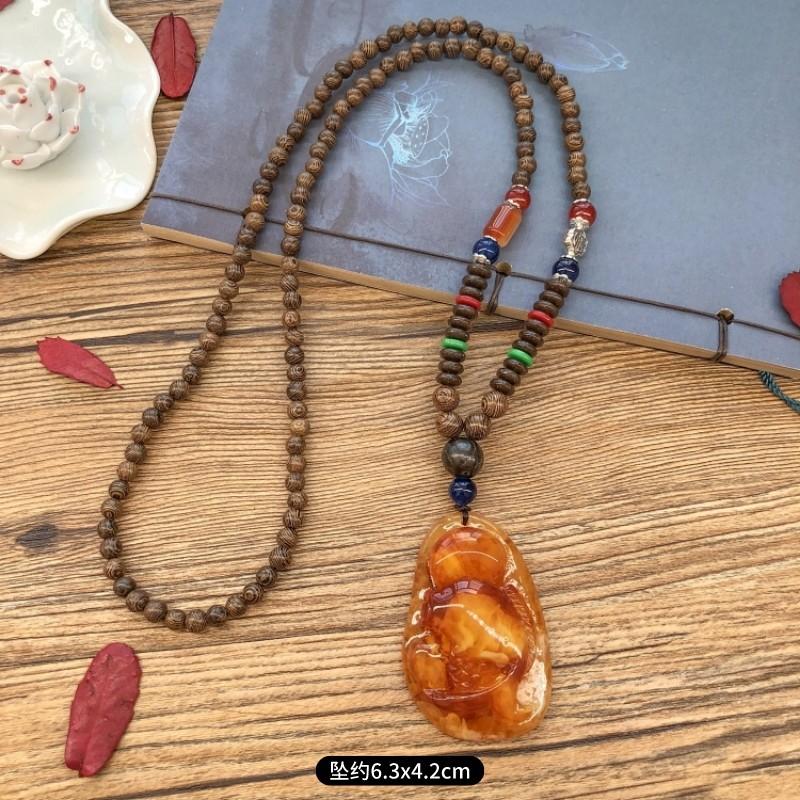 Retro chicken wing wood second generation old beeswax necklace men and women versatile amber pendant long sweater chain pendant