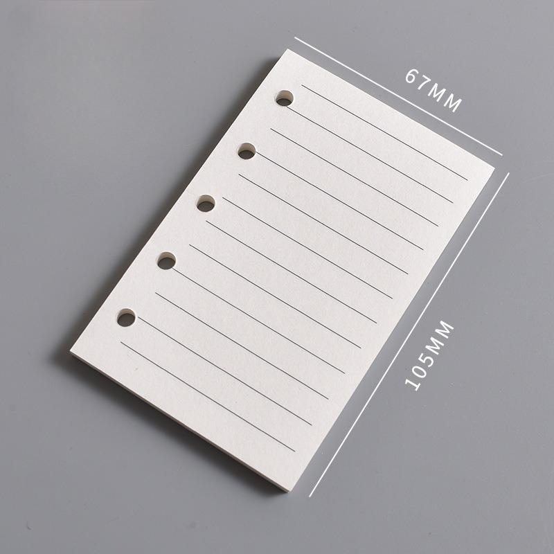 Die Innenseite des M5 Notizbuchs Die leere vertikale Linie des A8 Loseblatt-Kernquadrats und der Wochenplan Eine Seite pro Tag zum Eintragen