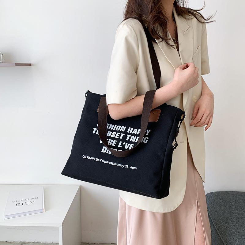 Simple canvas large-capacity casual bag women's 2025 new lazy style single shoulder fashion printed letter tote bag