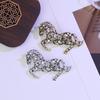 Two-Toned Gold & Silver Galloping Horse Brooch with Hollowed Diamonds - Grand, Fashionable, and Versatile Flower-Inspired Accessory.