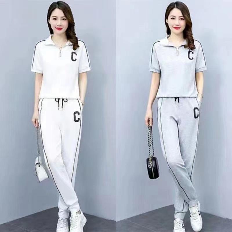 Abbigliamento Estivo da Donna Elegante Set Due Pezzi per la Stagione Estiva. Set con felpa casual sportivo alla moda in stile coreano.