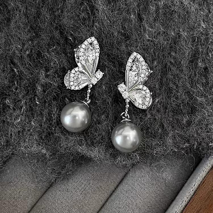 

Silver needle butterfly wings pearl earrings design simple light luxury temperament stud earrings 925 silver needle