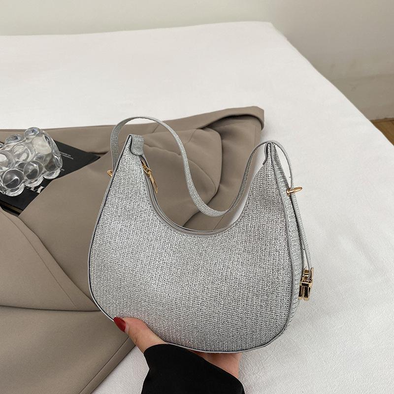 

Популярные женские сумки этого года 2025 лето новая однотонная сумка-подмышка модная и простая сумка-полумесяц-пельмень универсальная сумка через плечо серебряный