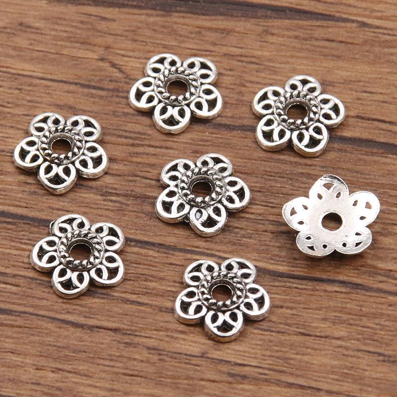 

Античні срібні роздільники-квіти: Багатостильовий, порожнистий дизайн для DIY браслетів та намист