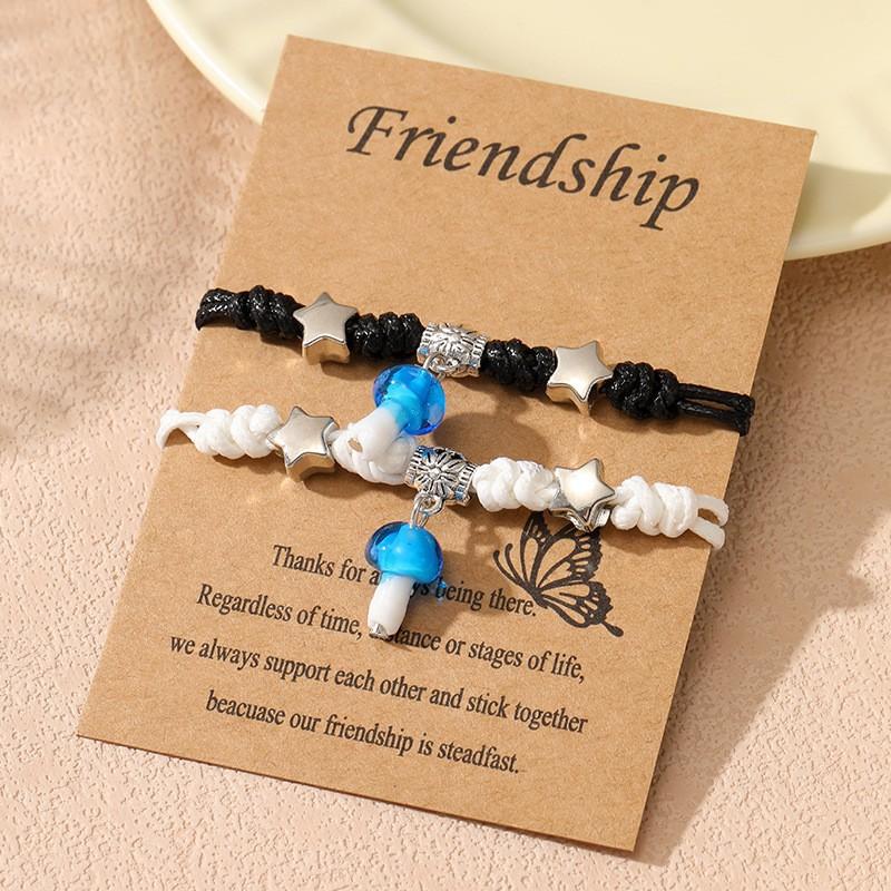 A pair of woven small mushroom couple bracelets, male and female student girlfriends, purely handmade jewelry.