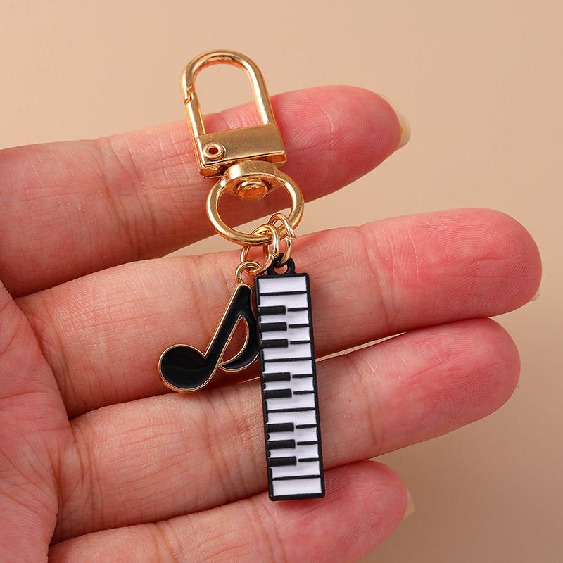 Niedlicher Emaille Mini-Klavier Schlüsselanhänger Simulation Musikinstrumente Schlüsselring Anhänger Damen Mädchen Handtaschen Dekoration DIY Schmuck Geschenk