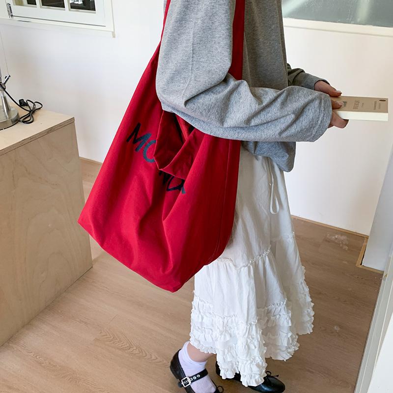 Lazy wind casual large-capacity underarm bag women's 2025 new letter-printed canvas bag shoulder bag