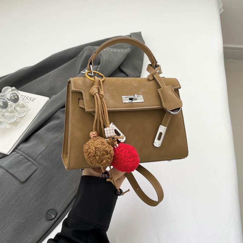 

Vintage 2025 high-end bag women s new niche design handbag fashionable and versatile simple shoulder oblique span bag separate bag хакі