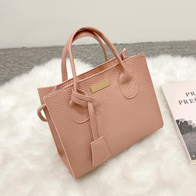 Damenhandtasche, Handytasche, Kosmetiktasche, kleine Einkaufstasche mit Litschi-Muster.