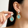 Xiaohongshu Retro French Blue Cat's Eye Stud Earrings with Zirconia Drops - Elegant and Fashionable.