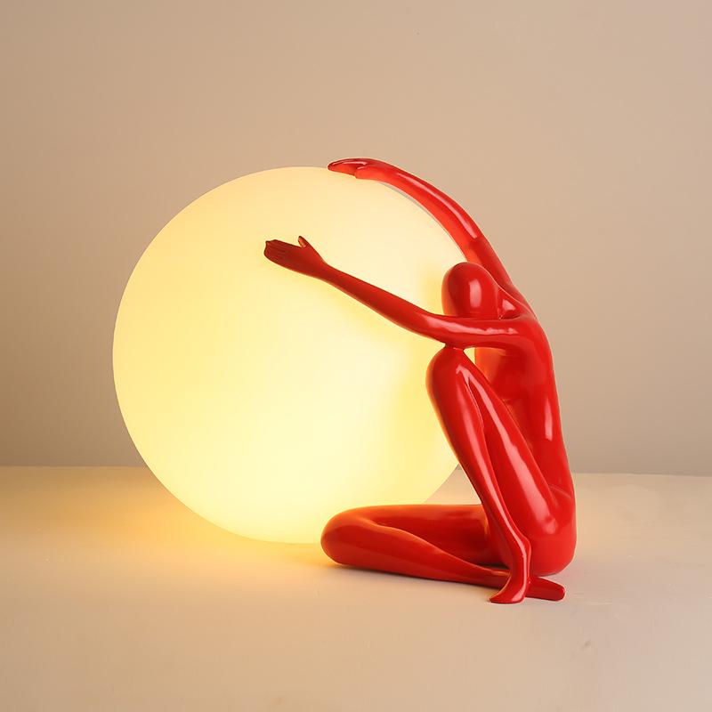 Modern Nordic Table Lamp Sculpture: Creative Doll Holding Luminous Ball for Bedroom and Living Room Decor